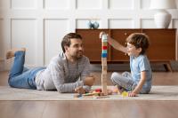 Father and Son Playing to Learn Emotional Intelligence